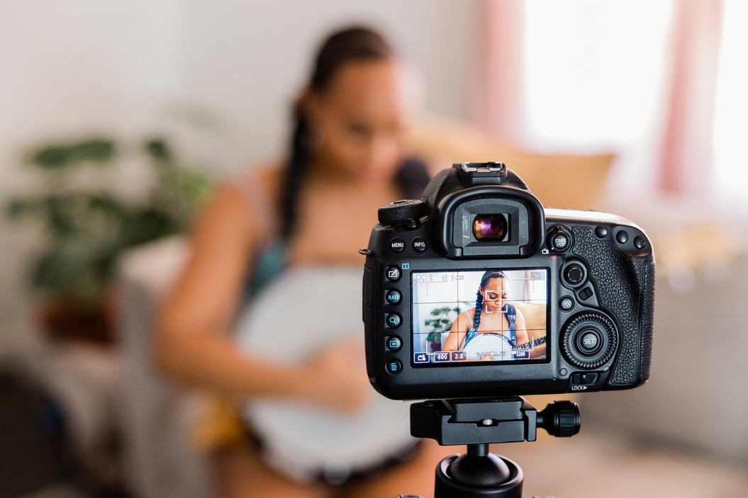 Woman Filming a Song Cover Video at Home